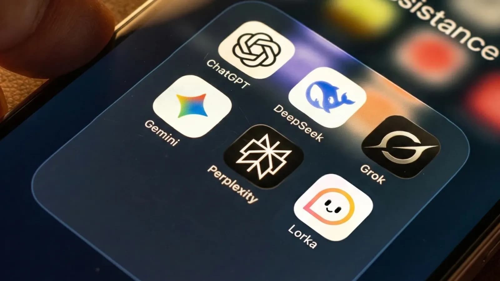 ChatGPT alternatives including Gemini, DeepSeek, Perplexity, Grok, and Lorka displayed as mobile app icons on a smartphone screen.